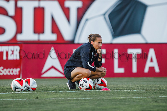 Paula Wilkins watches her team warm up